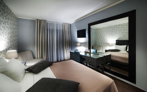 Imagen de la habitación del Hotel Theasis Paramythia. Foto 10