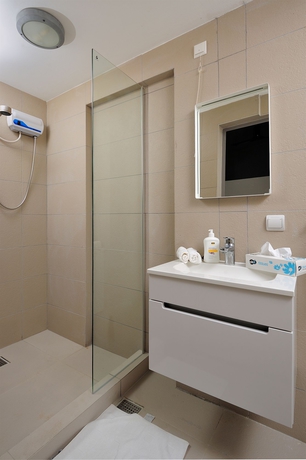 Imagen de la habitación del Hotel Thebonairian. Foto 10