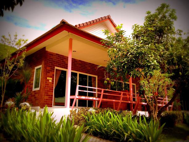 Imagen de la habitación del Hotel Theerama Cottage Resort. Foto 8