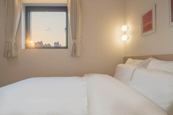 Imagen de la habitación del Hotel Thehyoosik Aank Cheonan Station 2. Foto 12
