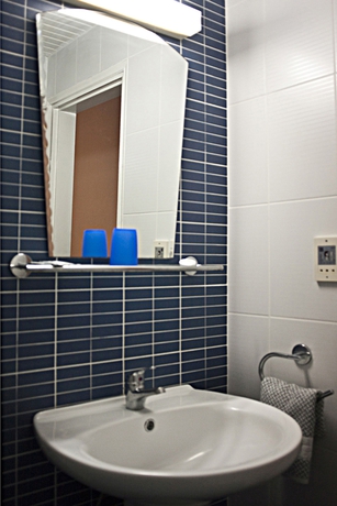 Imagen de la habitación del Hotel Theo Bungalows. Foto 13