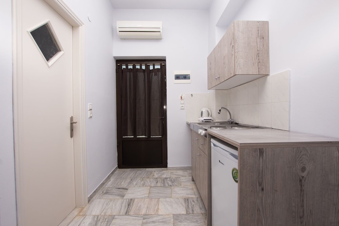 Imagen de la habitación del Hotel Theodora Studios. Foto 16
