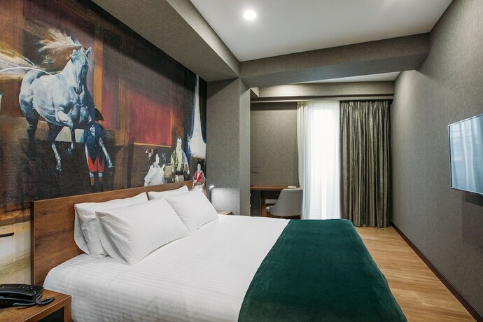 Imagen de la habitación del Hotel Theory. Foto 17