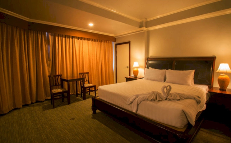 Imagen de la habitación del Hotel Thepnakorn. Foto 11