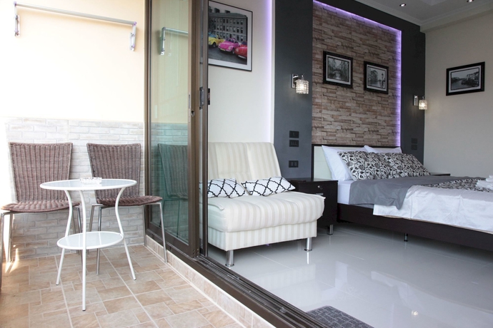 Imagen de la habitación del Hotel Thepthip Artdeco Apartments. Foto 16
