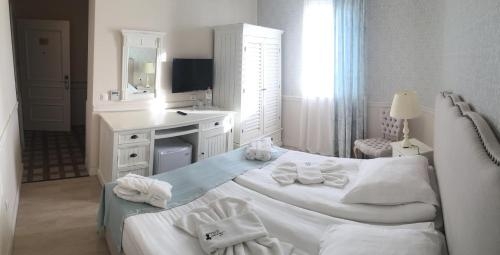 Imagen de la habitación del Hotel Therma Palace Balneohotel. Foto 8
