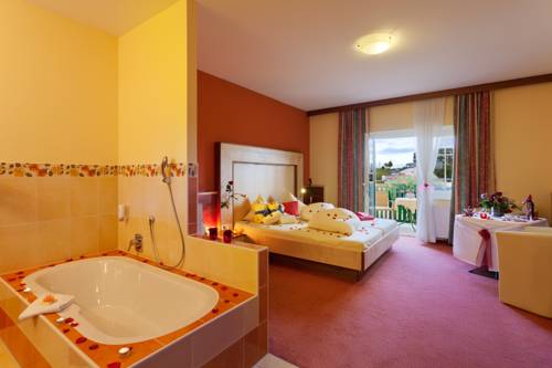 Imagen de la habitación del Hotel Thermenhotel Puchasplus. Foto 9