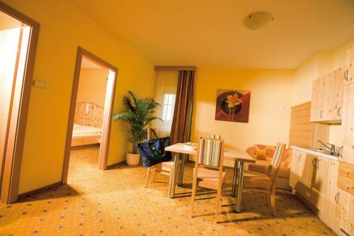 Imagen de la habitación del Hotel Thermenhotel Puchasplus. Foto 10