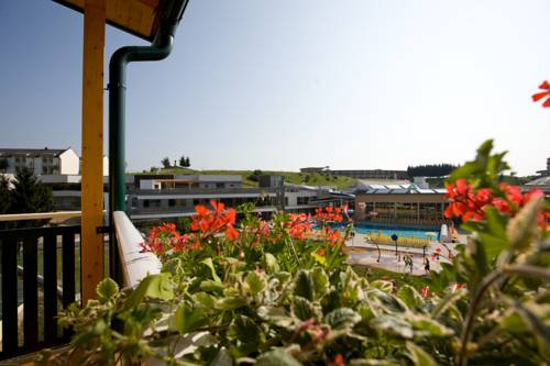 Imagen de la habitación del Hotel Thermenhotel Puchasplus. Foto 14