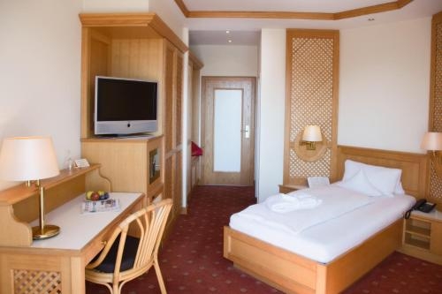 Imagen de la habitación del Hotel Thermenhotel Quellenhof. Foto 6