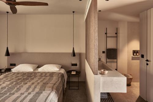 Imagen de la habitación del Hotel Theros All Suite - Adults Only. Foto 13