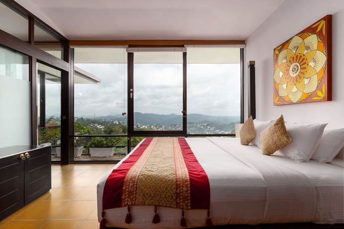 Imagen de la habitación del Hotel Theva Residency. Foto 5