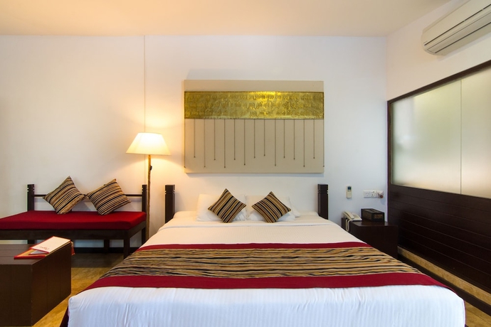 Imagen de la habitación del Hotel Theva Residency. Foto 10