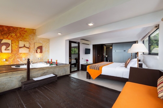 Imagen de la habitación del Hotel Theva Residency. Foto 11