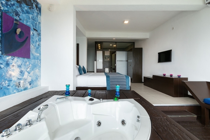 Imagen de la habitación del Hotel Theva Residency. Foto 12