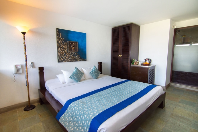 Imagen de la habitación del Hotel Theva Residency. Foto 13