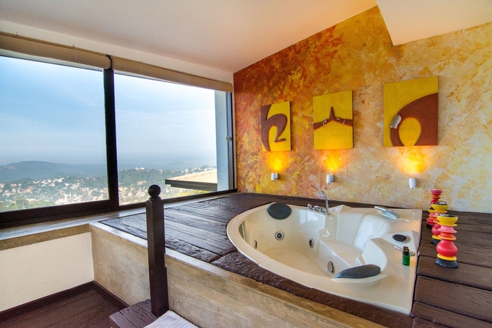 Imagen de la habitación del Hotel Theva Residency. Foto 14