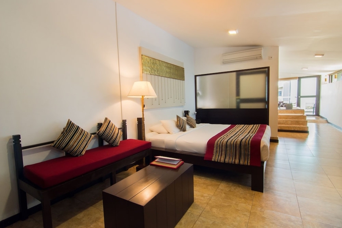 Imagen de la habitación del Hotel Theva Residency. Foto 15