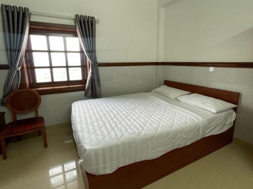 Imagen de la habitación del Hotel Thien Tan. Foto 19