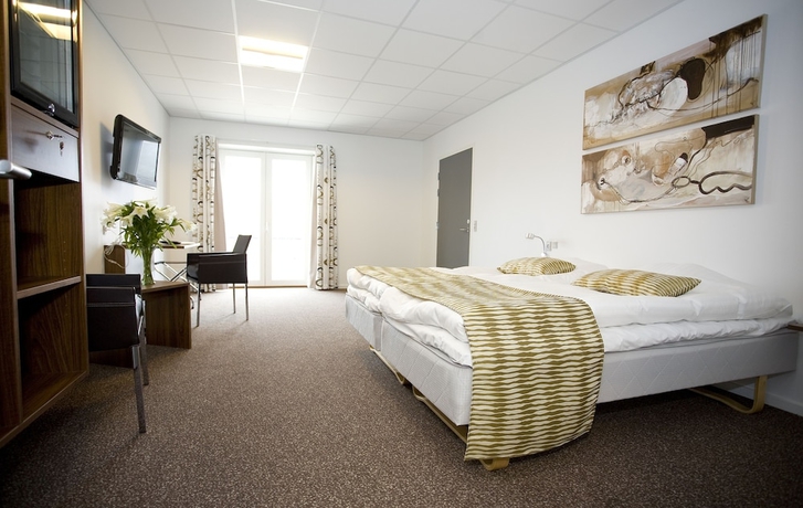 Imagen de la habitación del Hotel Thinggaard. Foto 5