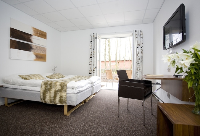 Imagen de la habitación del Hotel Thinggaard. Foto 8