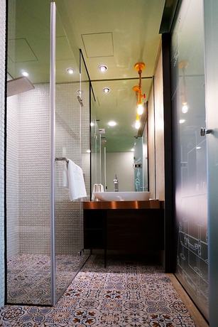 Imagen de la habitación del Hotel Thinker Hotel. Foto 11
