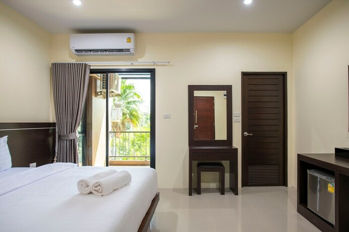 Imagen de la habitación del Hotel Thip Thip. Foto 16