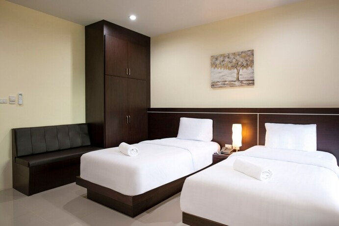 Imagen de la habitación del Hotel Thip Thip. Foto 19