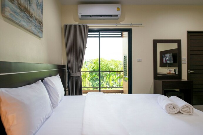 Imagen de la habitación del Hotel Thip Thip. Foto 20