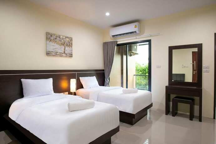 Imagen de la habitación del Hotel Thip Thip. Foto 22