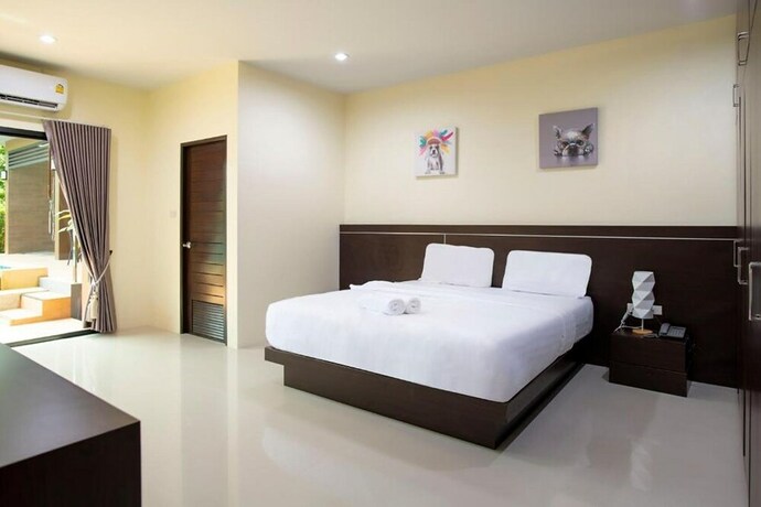 Imagen de la habitación del Hotel Thip Thip. Foto 28