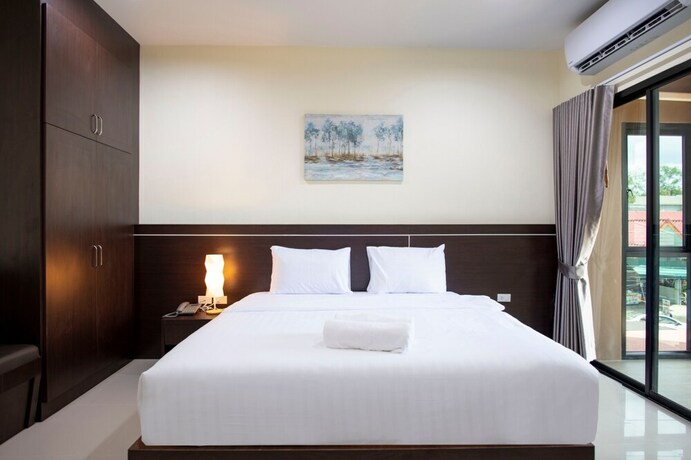 Imagen de la habitación del Hotel Thip Thip. Foto 31