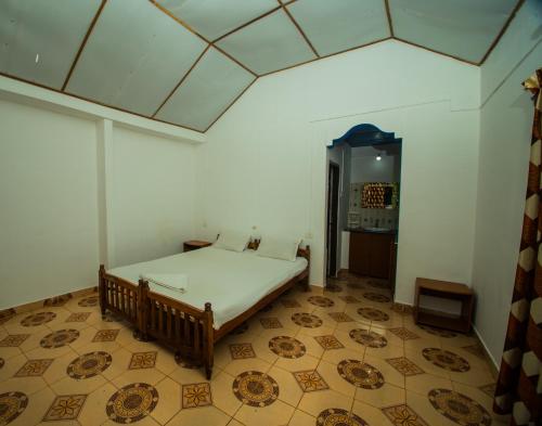 Imagen de la habitación del Hotel Thiruvambadi Beach Retreat. Foto 6