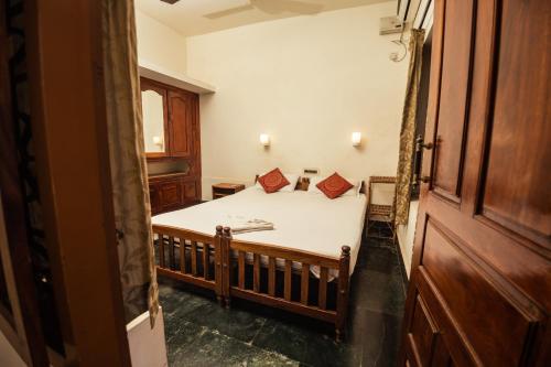 Imagen de la habitación del Hotel Thiruvambadi Beach Retreat. Foto 7