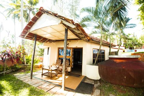 Imagen de la habitación del Hotel Thiruvambadi Beach Retreat. Foto 9