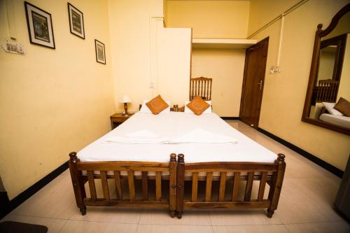 Imagen de la habitación del Hotel Thiruvambadi Beach Retreat. Foto 10