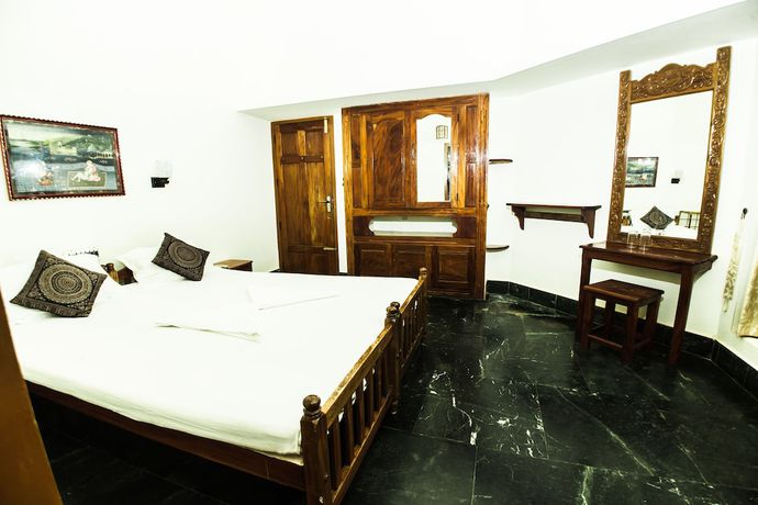 Imagen de la habitación del Hotel Thiruvambadi Beach Retreat. Foto 8