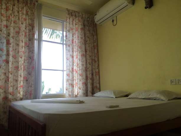 Imagen de la habitación del Hotel Thiruvambadi Beach Retreat. Foto 10