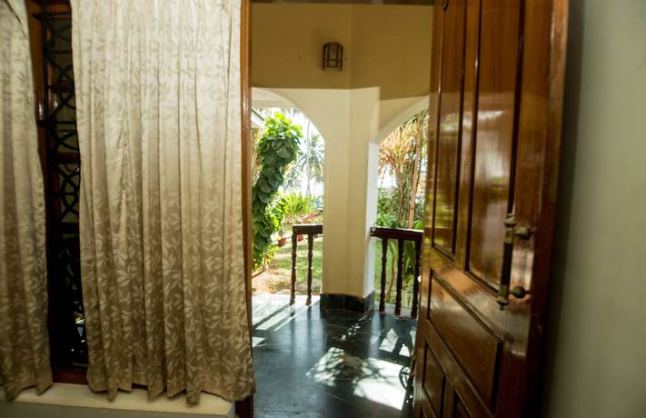 Imagen de la habitación del Hotel Thiruvambadi Beach Retreat. Foto 11