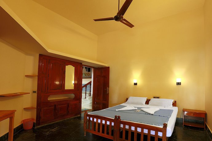 Imagen de la habitación del Hotel Thiruvambadi Beach Retreat. Foto 14