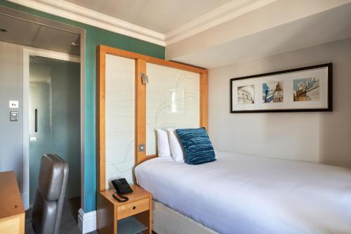 Imagen de la habitación del Hotel Thistle London Park Lane. Foto 2