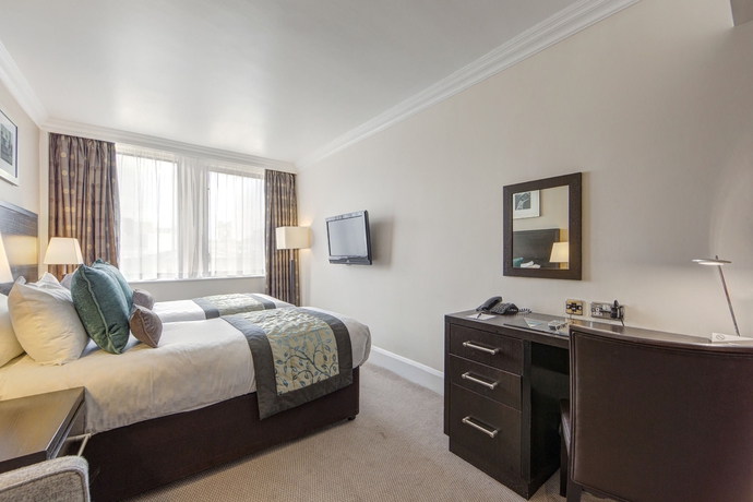 Imagen de la habitación del Hotel Thistle London Trafalgar Square. Foto 13