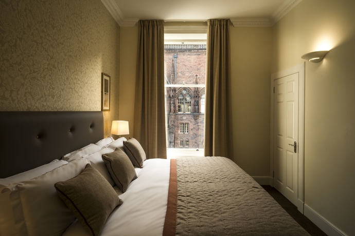 Imagen de la habitación del Hotel Thistle Suites Royal Garden. Foto 9