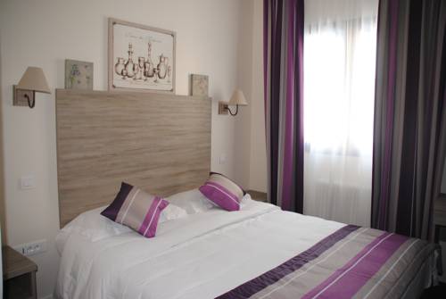 Imagen de la habitación del Hotel Thoiry Etoile Lodge. Foto 11