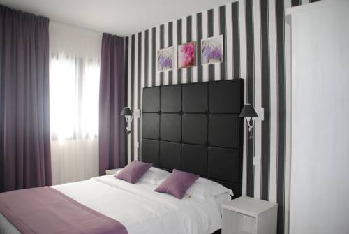 Imagen de la habitación del Hotel Thoiry Etoile Lodge. Foto 12