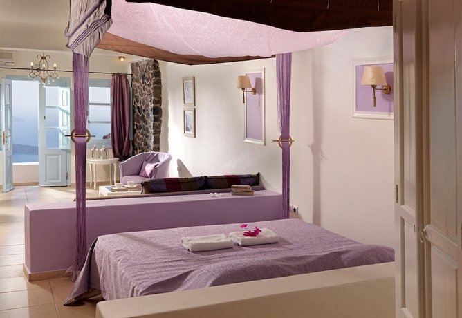 Imagen de la habitación del Hotel Tholos Resort. Foto 10