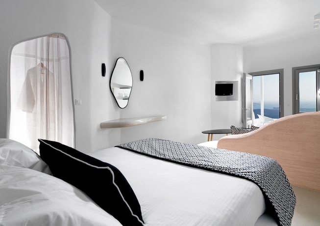 Imagen de la habitación del Hotel Tholos Resort. Foto 12