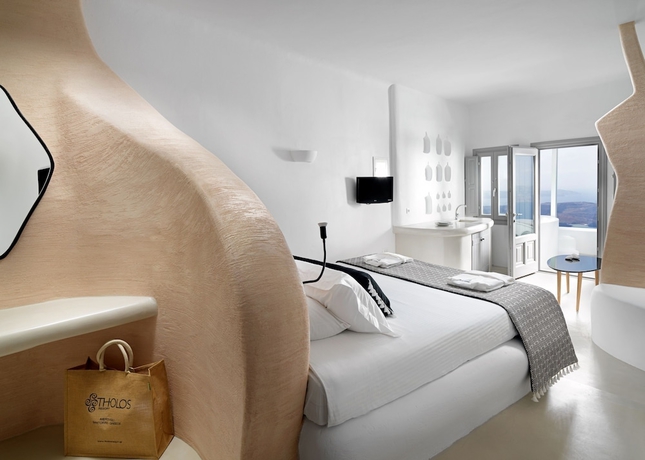Imagen de la habitación del Hotel Tholos Resort. Foto 13