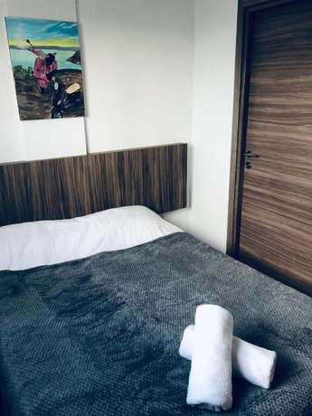 Imagen de la habitación del Hotel Thomas Apartments. Foto 6
