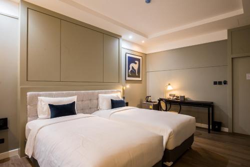 Imagen de la habitación del Hotel Thomas Bangkok, Makkasan. Foto 18